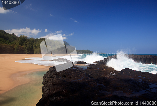 Image of Waves over rocks on Lumahai