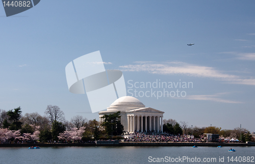 Image of Plane taking off over Jefferson Memorial