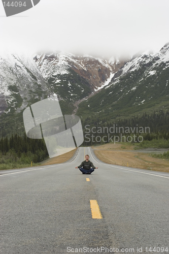 Image of Sitting, meditating. On the road? Whatever