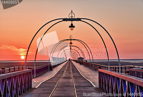 Image of Sun setting on Southport pier