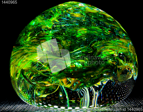 Image of Green blown glass ball like forest leaves