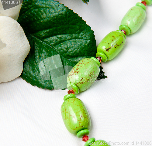 Image of Close up of green home made beads