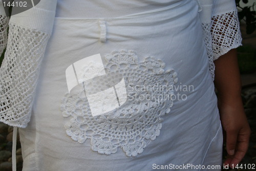 Image of Crocheted pattern on skirt