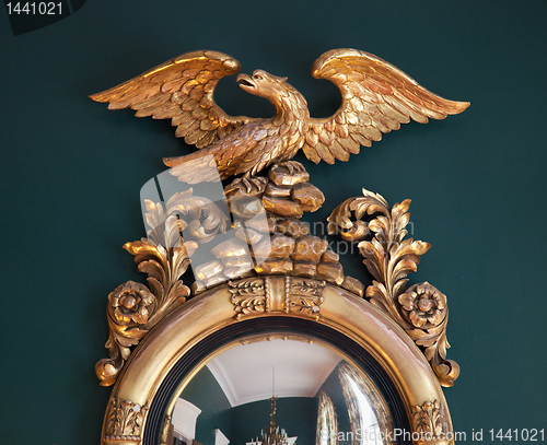 Image of Ornate gold mirror