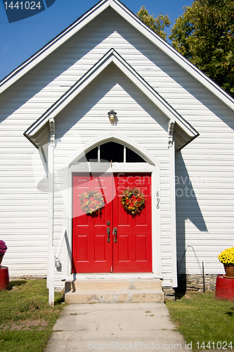 Image of Close up of red church doors