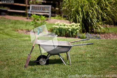 Image of Wheelbarrow and spade