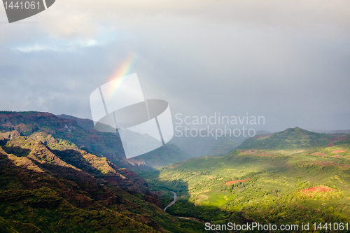 Image of Rainbow over Waimea canyon in Kauai