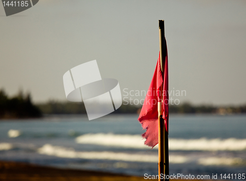 Image of Red flag at sunset