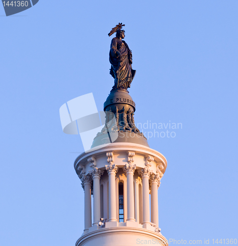 Image of Sunrise behind the Statue of Freedom in DC