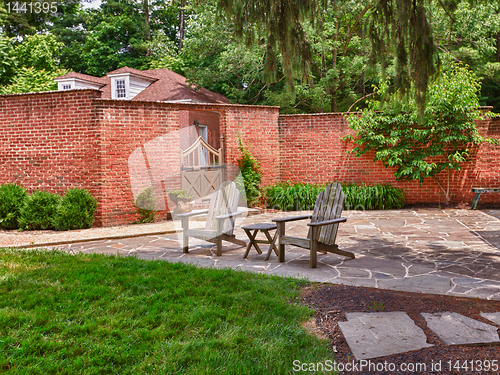 Image of Cape cod chairs on stone patio