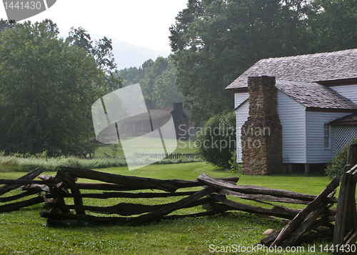 Image of White framed farm buildings