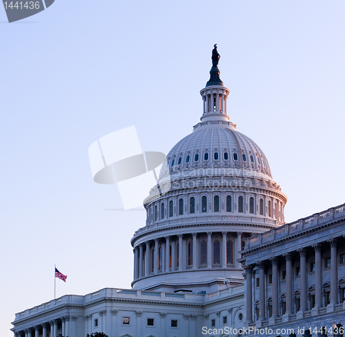 Image of Sunrise behind the dome of the Capitol in DC