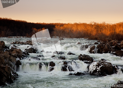 Image of Sun sets behind Great Falls near Washington