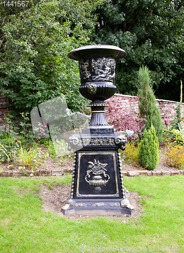 Image of Ornate black garden vase