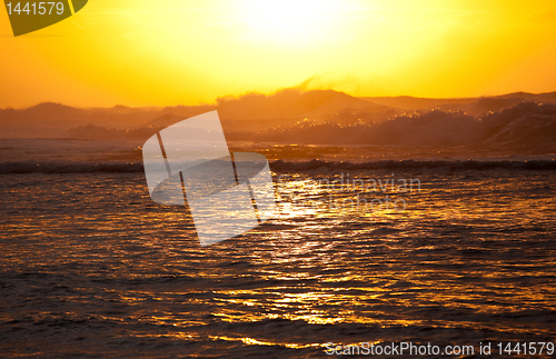 Image of Orange sunset over Na Pali