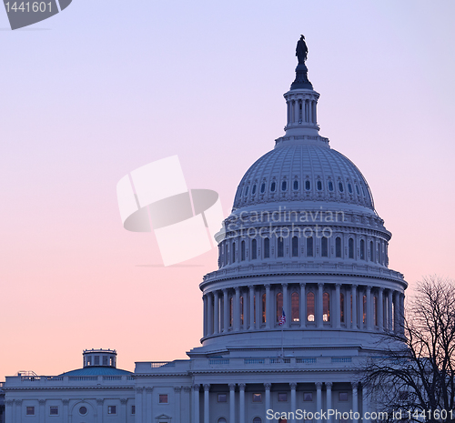 Image of Sunrise behind the dome of the Capitol in DC