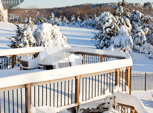 Image of Deep snow on deck with table