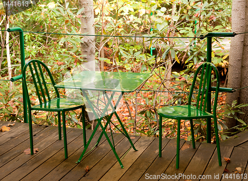 Image of Green table and chairs