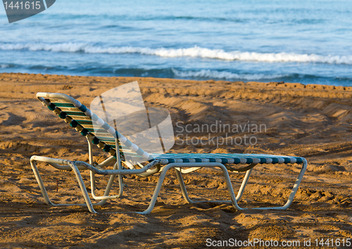 Image of Olf sun lounger on beach