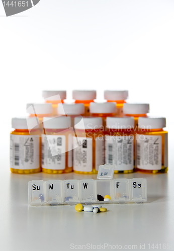 Image of Vertical set of prescription drug bottles