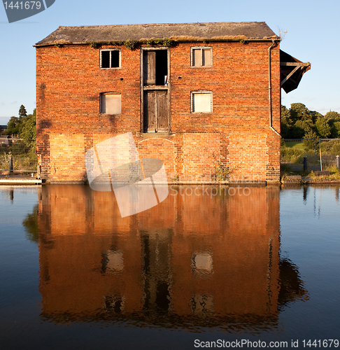 Image of Reflection of red brick warehouse in Ellesmere Canal