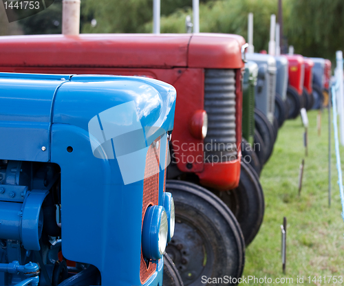 Image of Row of old tractors