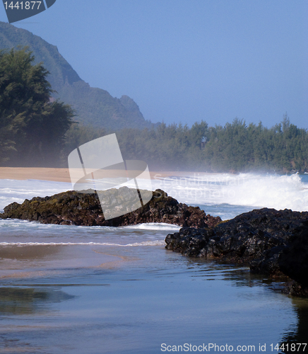 Image of Waves over rocks on Lumahai