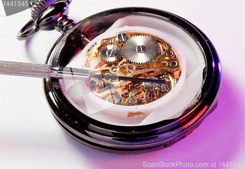 Image of Antique watch with jewellers screwdriver