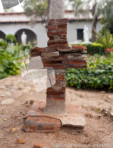 Image of Old brick cross in Mission