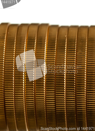 Image of Edge view of stack of golden coins