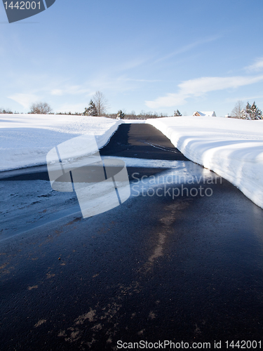 Image of Empty drive cleared of snow