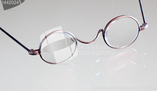 Image of Antique reading glasses isolated