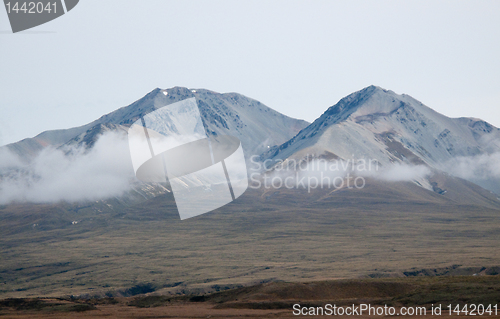 Image of New Zealand hills over a lake