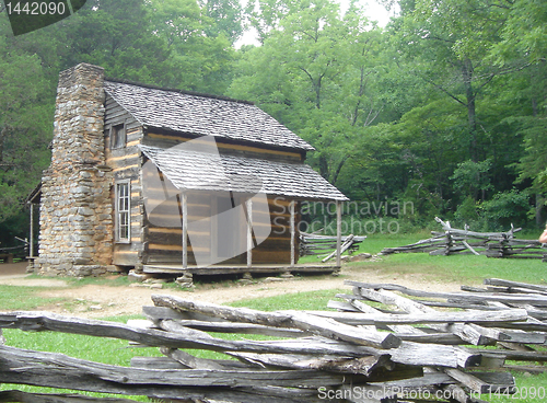 Image of  Primitive wooden building in rustic forest setting