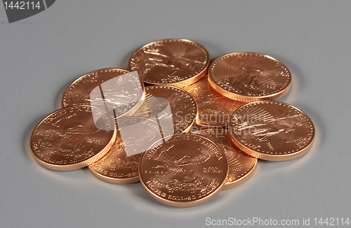 Image of Pile of US Eagle gold coins