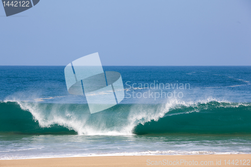 Image of Waves over beach on Lumahai