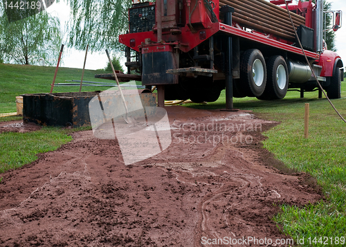 Image of Drilling well in yard