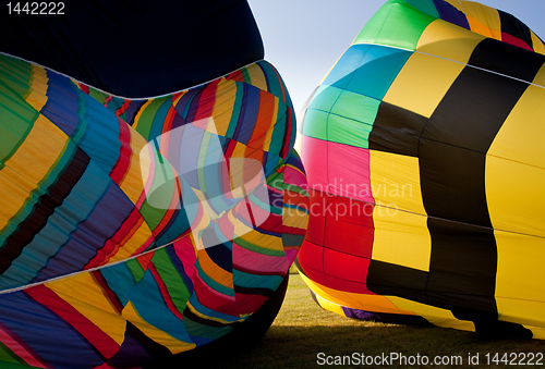 Image of Two Hot air balloons being inflated