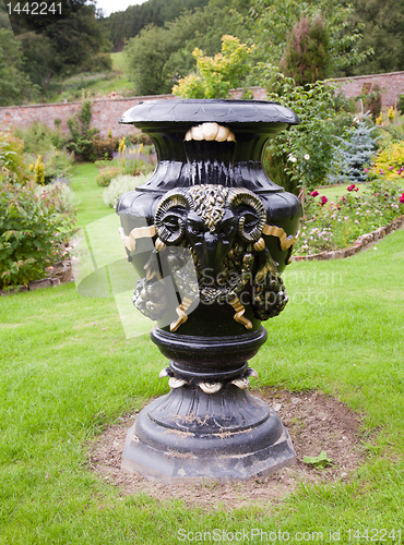 Image of Ornate black garden vase