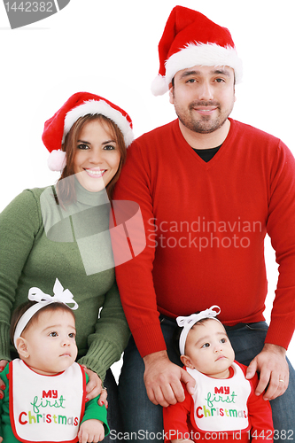 Image of Happy family in Christmas costumes 