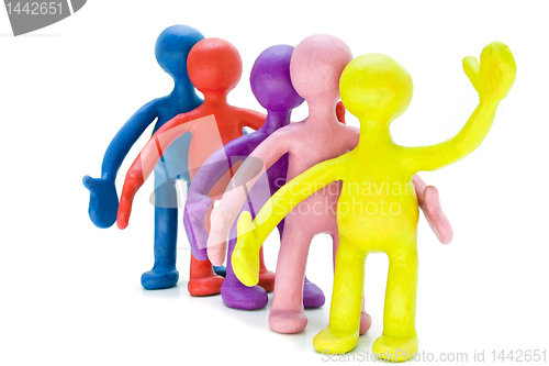 Image of Group of plasticine puppets signing by hands