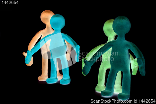 Image of Plasticine puppets pair standing near each other