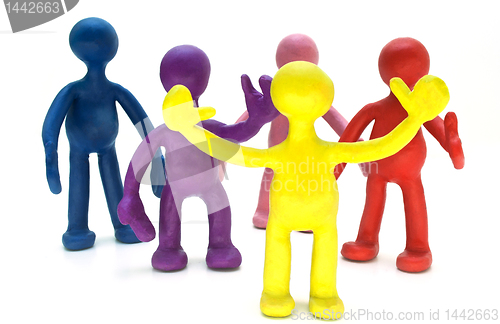 Image of Group of plasticine puppets on white background