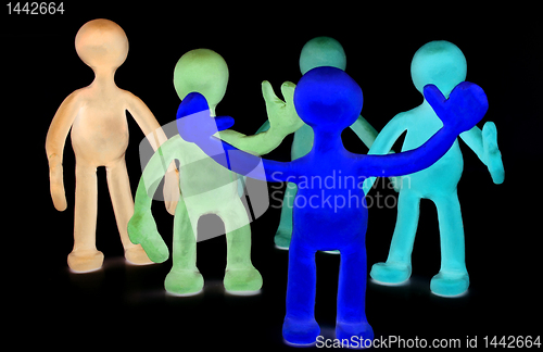 Image of Group of plasticine puppets on black background