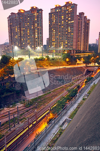 Image of City and train rail, sunset moment