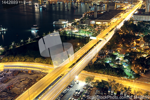 Image of traffic in modern city at night