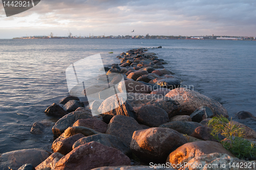 Image of Pier from stones on a sunset