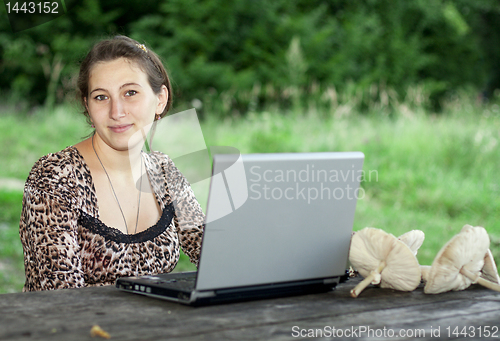 Image of Young girl with laptop