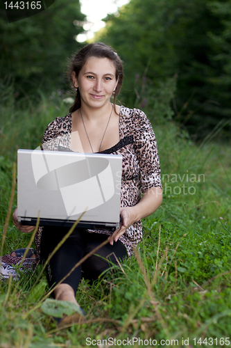 Image of Young girl with laptop