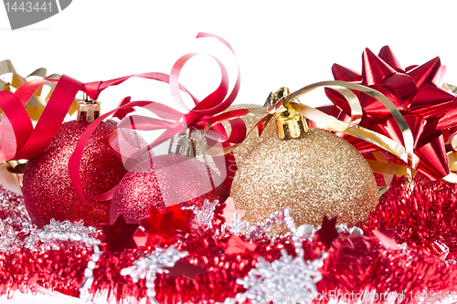 Image of christmas balls with ribbon and tinsel